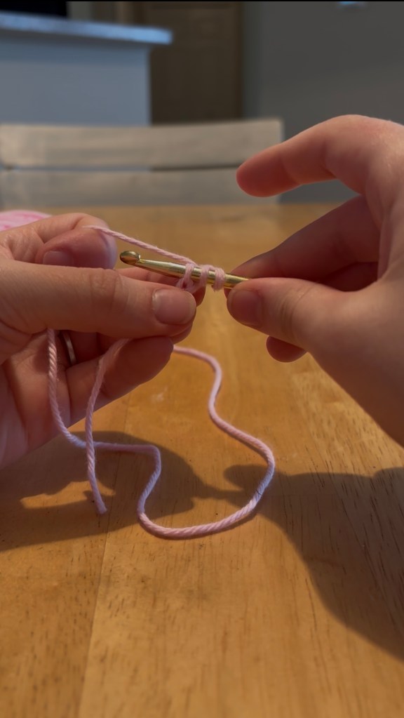 step 3: yarn over and insert your hook into the second chain from hook