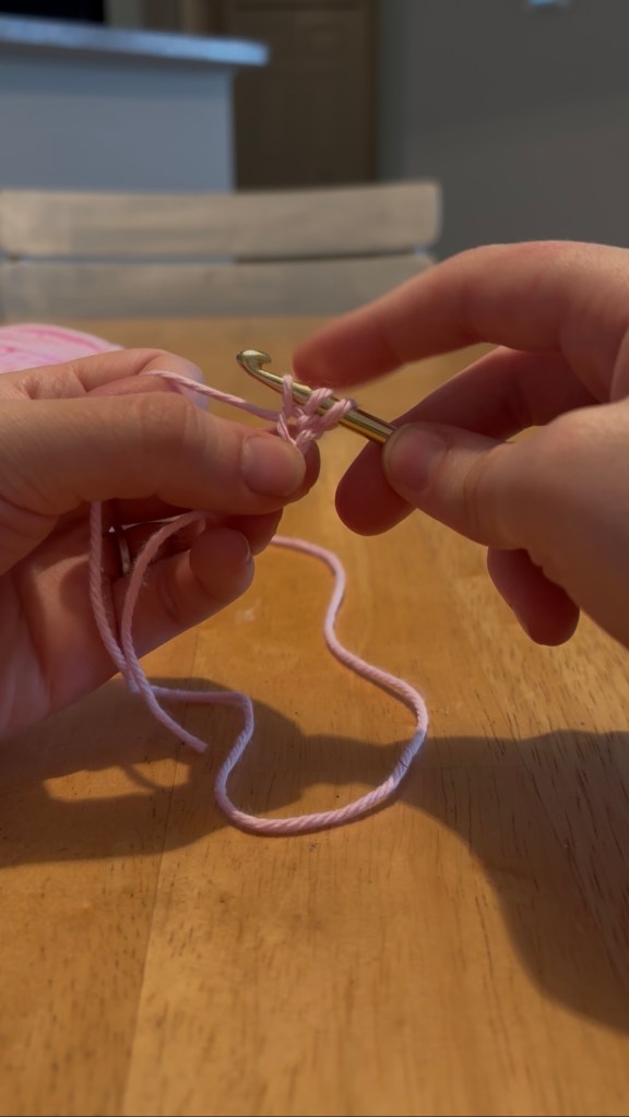 step 4: yarn over and pull through the top loop