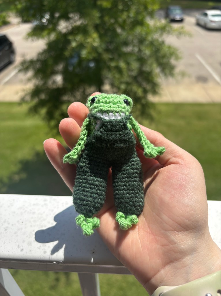 crochet long legged frog in overalls amigurumi