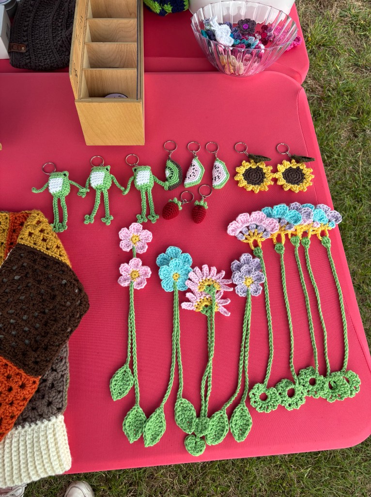 crochet bookmarks with crochet frog, fruit, and flower keychains
