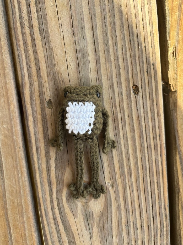 dark green crochet frog plushie
